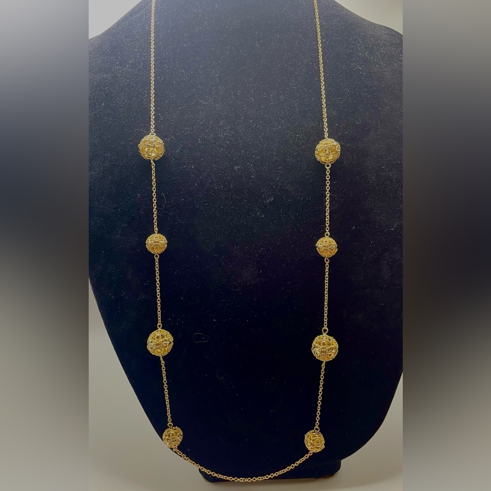 Long Gold Tone Necklace with Eight Filigree Ball Stations. 40 inch/ 2 inch ext.